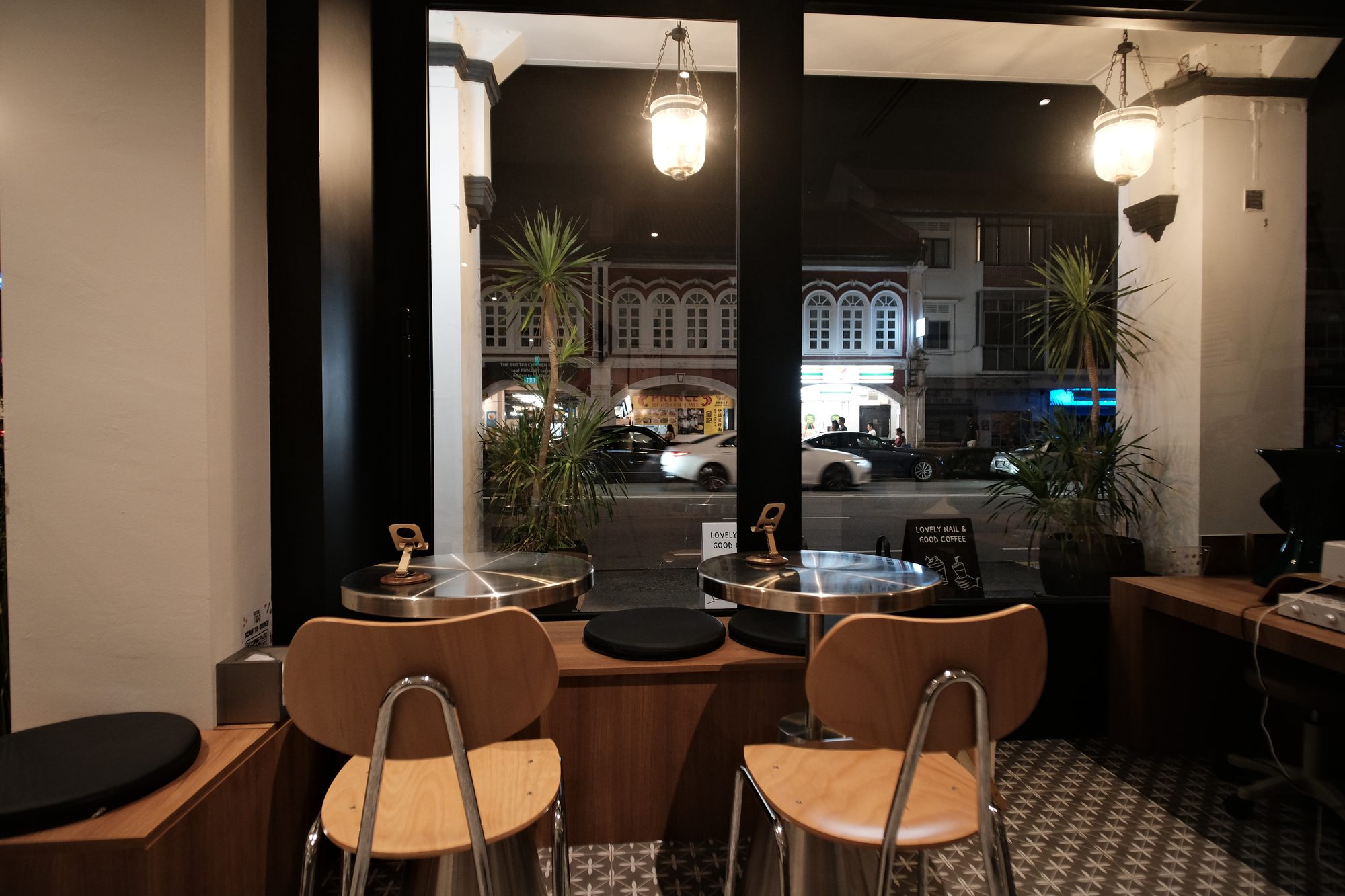 Five-foot-way seating outside Seek In Nail and Cafe heritage shophouse Singapore