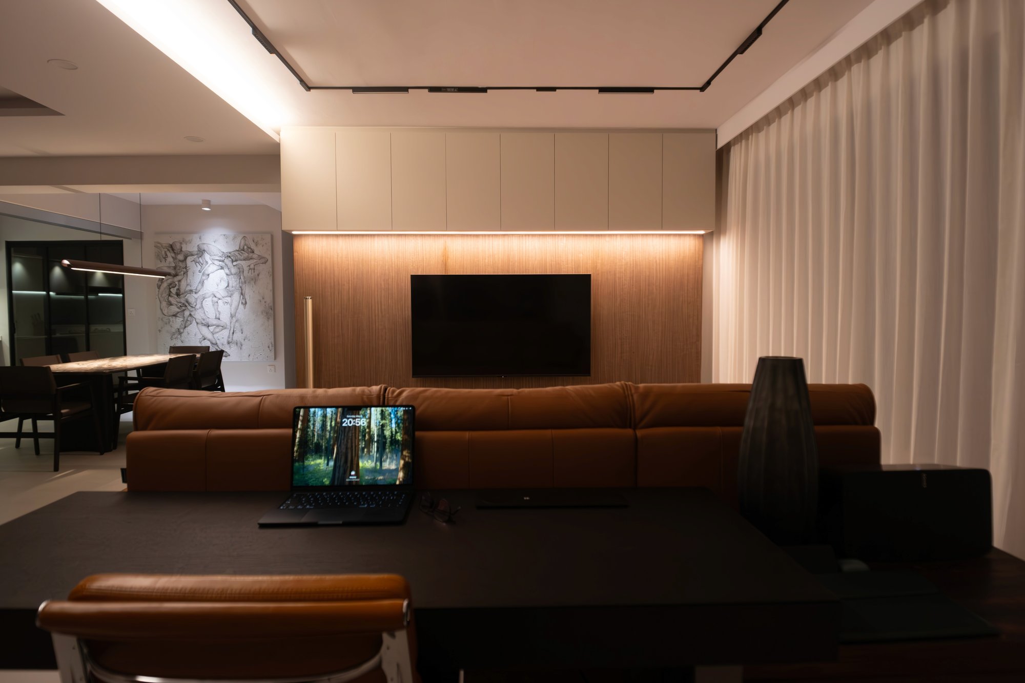 Open concept living room with warm ambient lighting